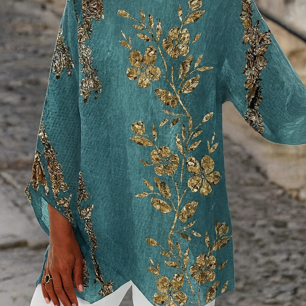 Langermet bluse med gyldent blomsterprint