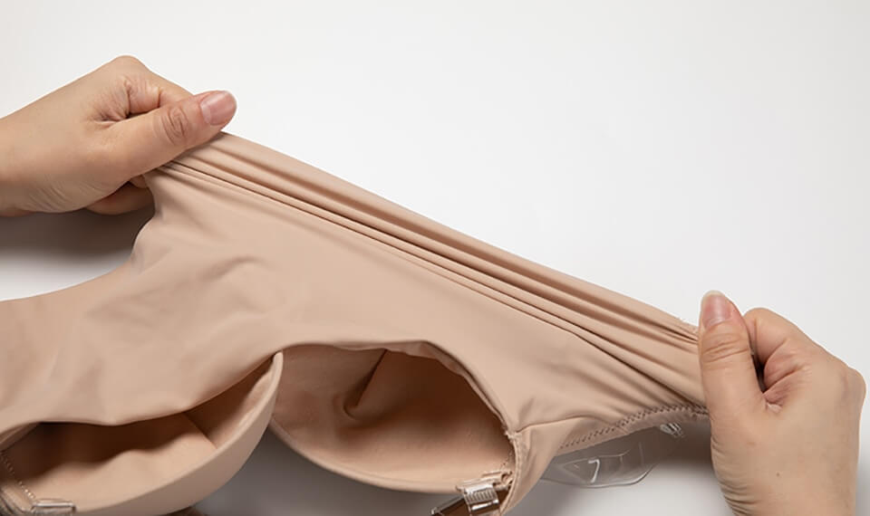 Djup V-ringad rygglös body shaper för osynlig siluett