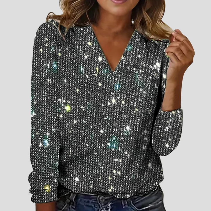 Elegant glitterblus med v-ringning och långa ärmar