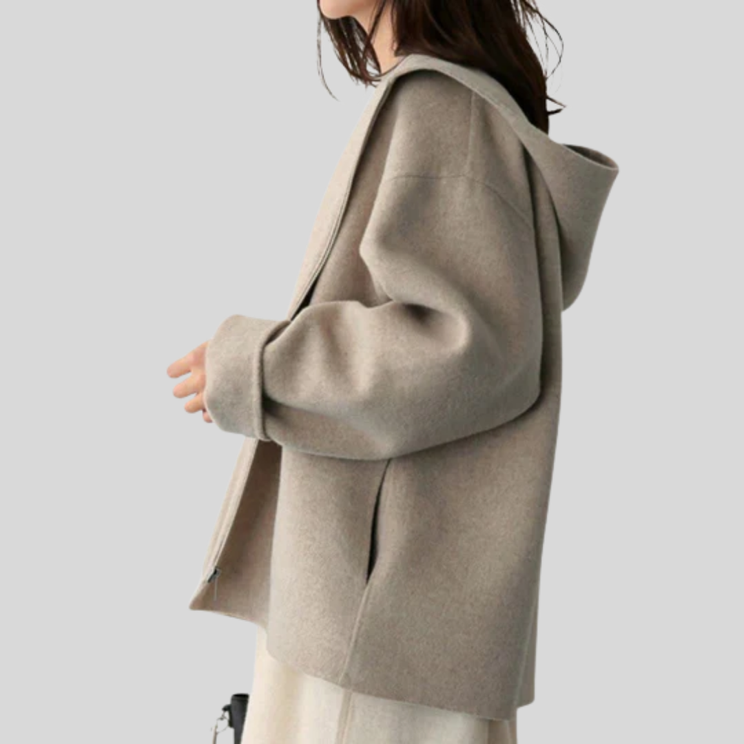 Damjacka med huva och funktionell design