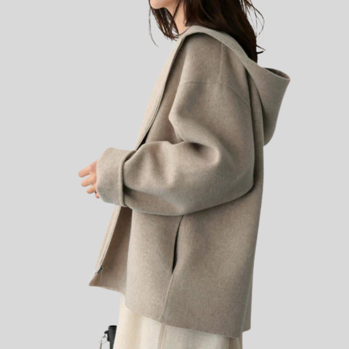 Damjacka med huva och funktionell design