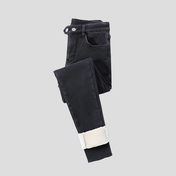 Vinterjeans med hög midja och fodrade damkläder för kalla dagar