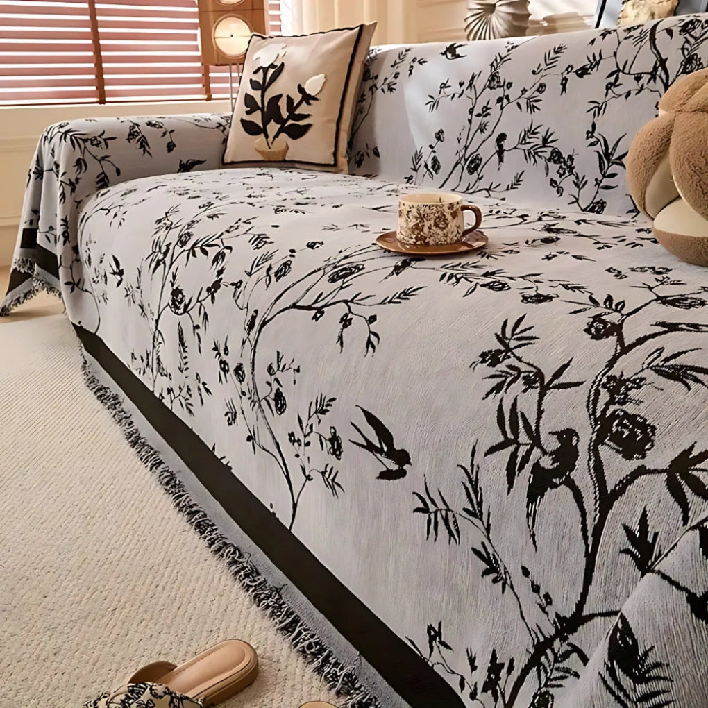 Elegant blommönsterpläd med fransar