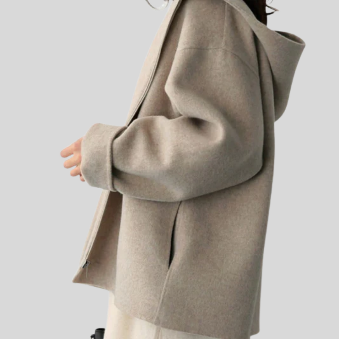 Damjacka med huva och funktionell design