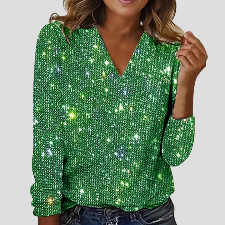 Elegant glitterblus med v-ringning och långa ärmar