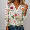 Blommig blus med avslappnad effekt