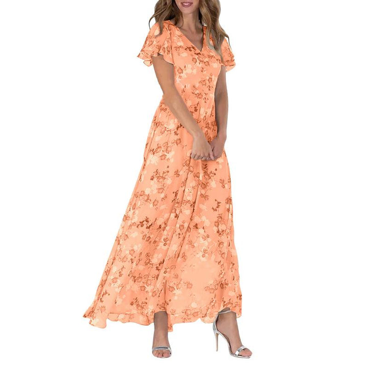 Maxiklänning med fjärilsärmar och blommönster