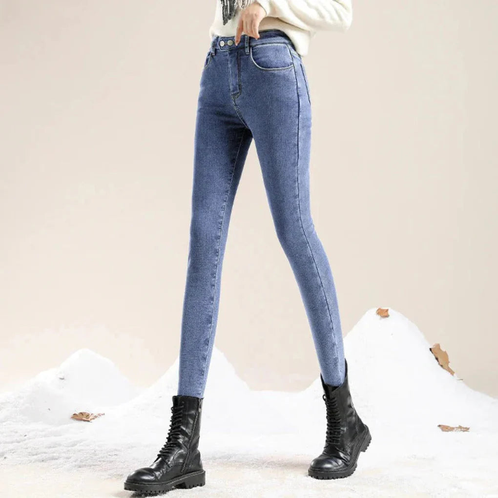 Vinterjeans med hög midja och fodrade damkläder för kalla dagar