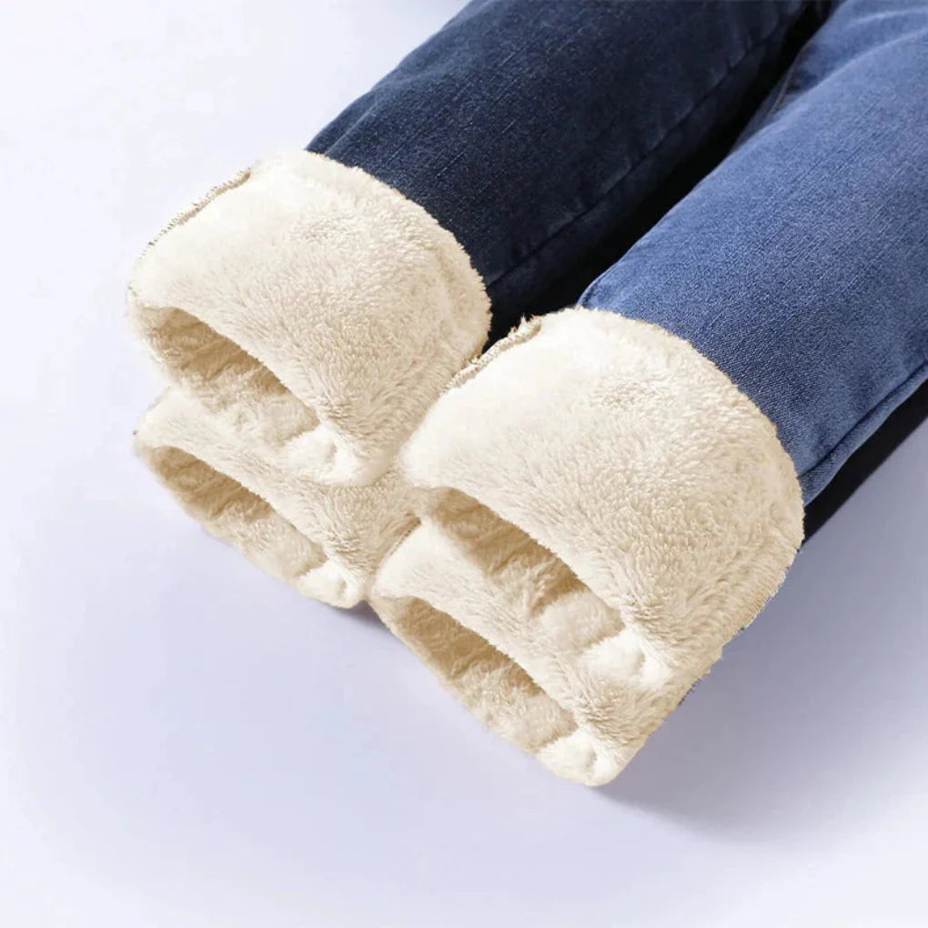 Vinterjeans med hög midja och fodrade damkläder för kalla dagar