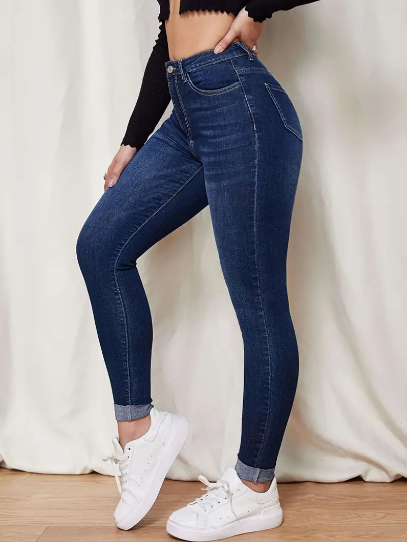 Smala jeans med hög midja och en knapp