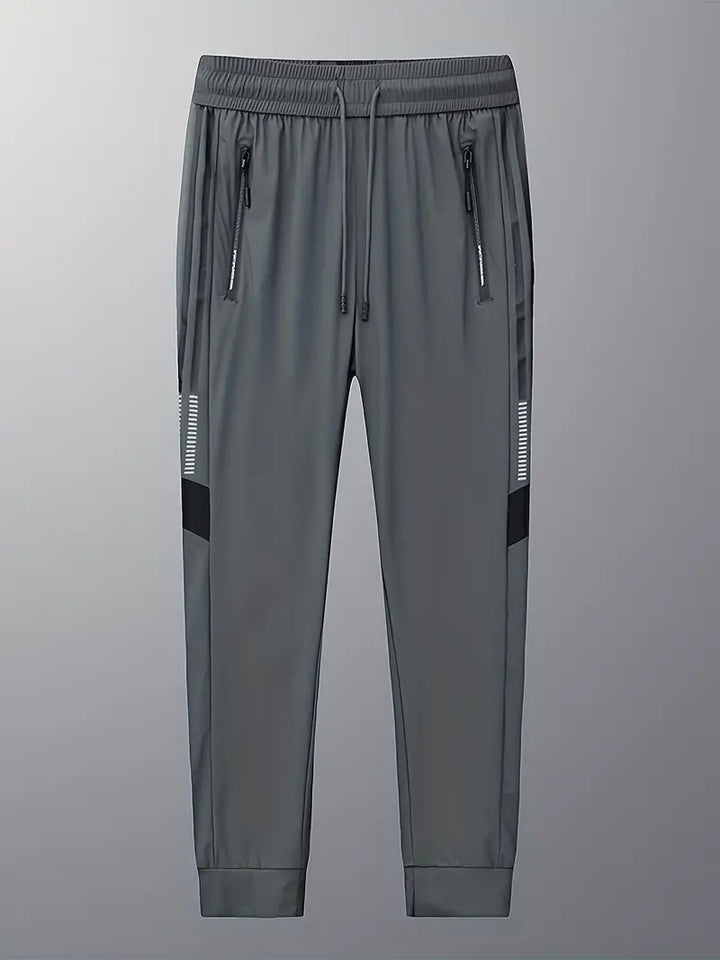 Snabbtorkande blixtlåsficka Casual stretchiga fitnessbyxor