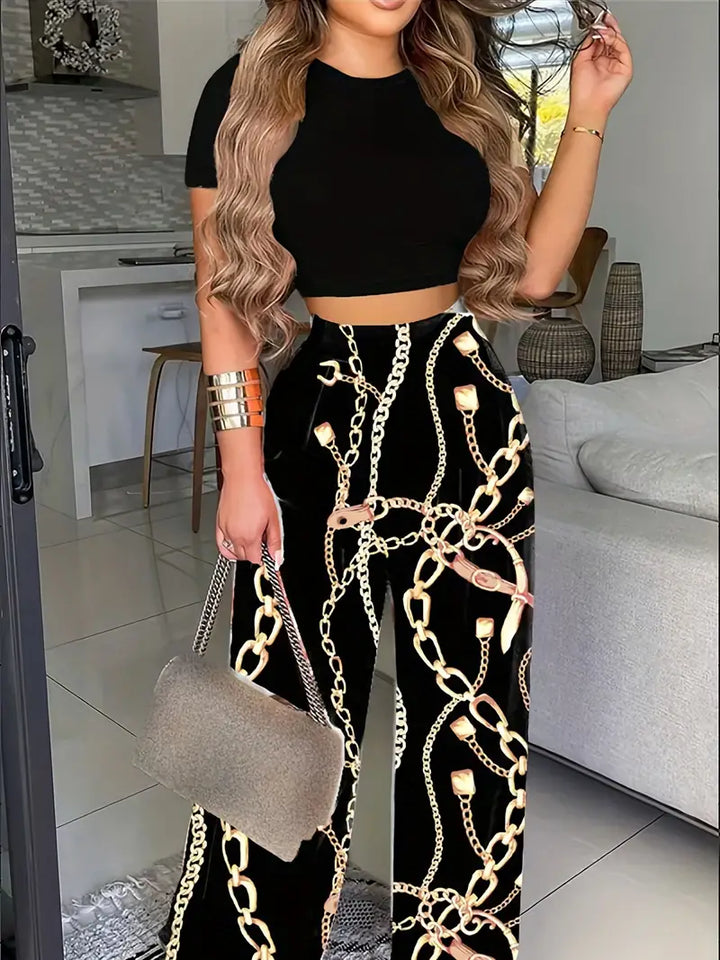 Chara -Boho bliss Cropped T-shirt med blommigt tryck och byxor med vida ben